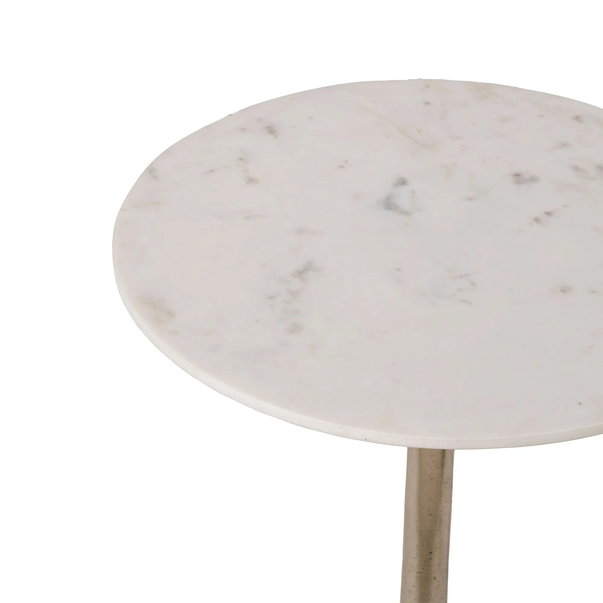 The Eloa features a round white marble top with subtle grey veining, shown from above on a white background, with part of its slim, light-colored tulip table base visible.