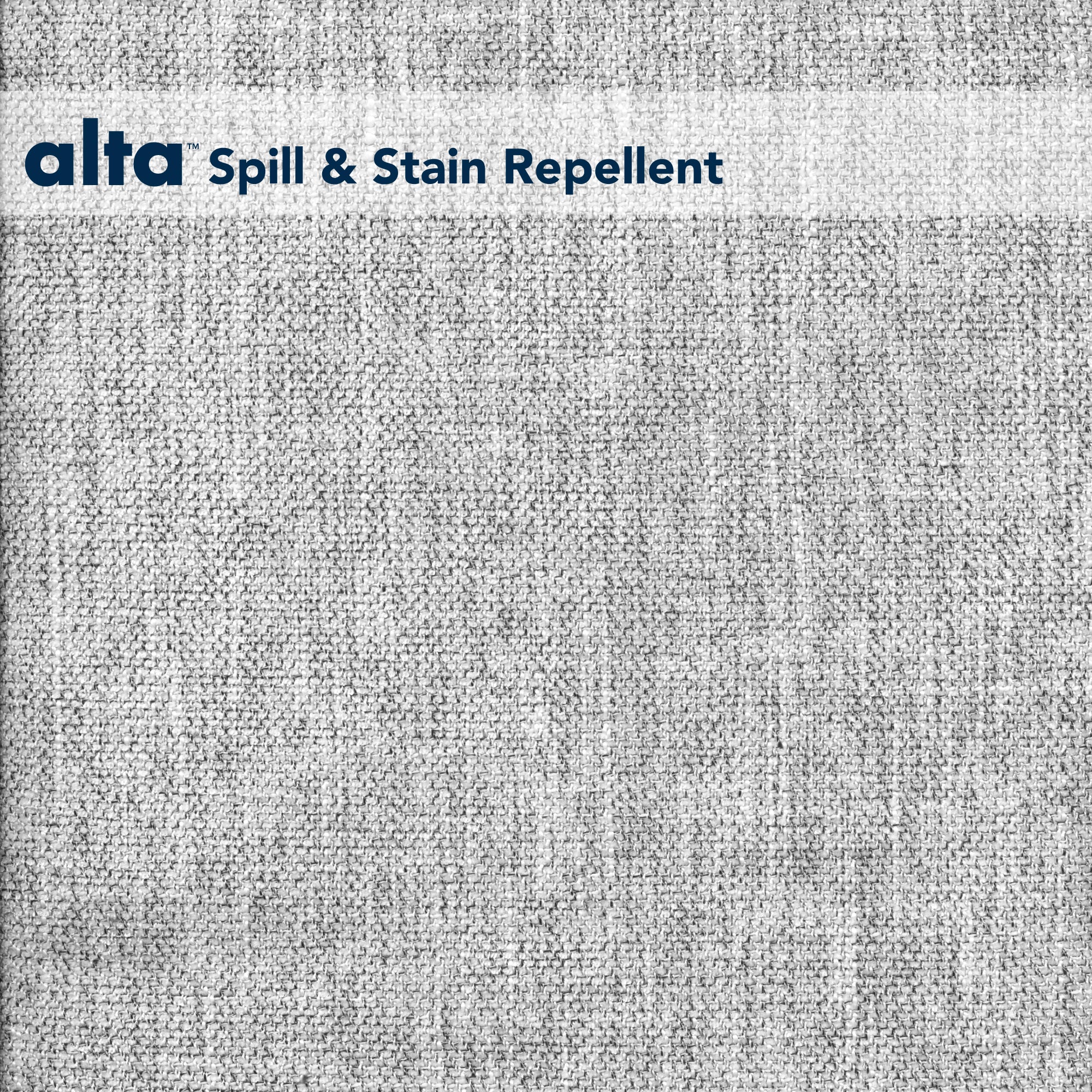 Tuxedo features gray textured performance fabric with a white top-left banner that says alta Spill & Stain Repellent in blue, emphasizing its contract-grade upholstery and stain-resistant properties.
